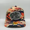 Bass Pro Shops Camuflada Naranja Parche Gris