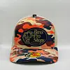 Bass Pro Shops Camuflada Naranja Parche Azul